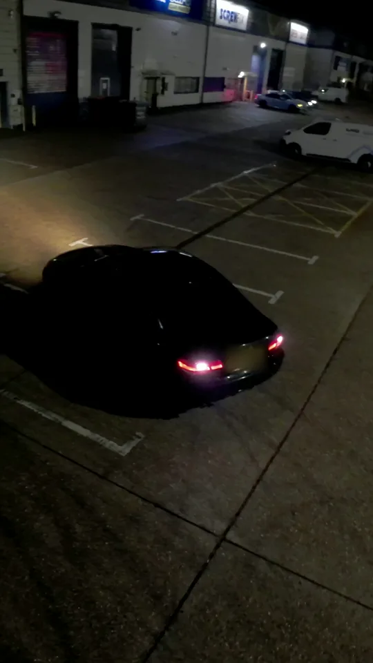 FPV perspective following a car after dark